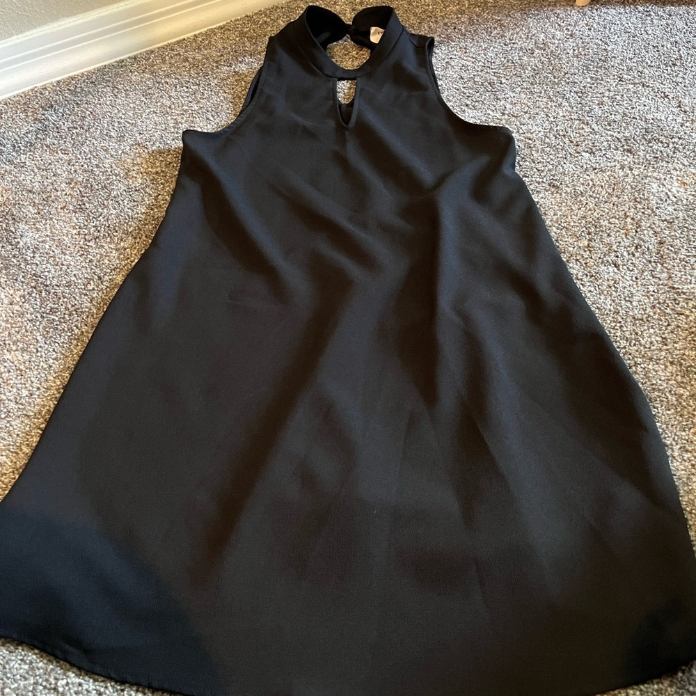 Adorable like new black dress. Size small. Knee length.